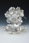 A PAIR OF ITALIAN SILVER COLOURED LEAF SHAPED DISHES