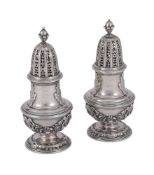 A PAIR OF GEORGE II CAST SILVER BALUSTER SUGAR CASTERS