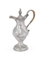 A GEORGE III SILVER WRYTHEN BALUSTER EWER