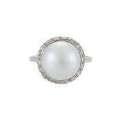 A MID 20TH CENTURY DIAMOND AND CULTURED PEARL CLUSTER RING
