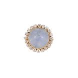 A STAR SAPPHIRE AND DIAMOND CLUSTER DRESS RING