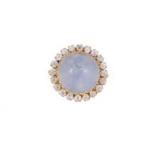 A STAR SAPPHIRE AND DIAMOND CLUSTER DRESS RING