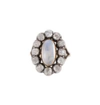 A DIAMOND AND MOONSTONE CLUSTER DRESS RING