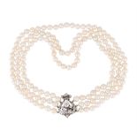 A THREE STRAND NATURAL PEARL NECKLACE WITH LATE 19TH CENTURY AND LATER DIAMOND CLASP