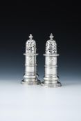 A PAIR OF QUEEN ANNE SCOTTISH SILVER LIGHTHOUSE CASTERS