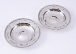 A PAIR OF SILVER ARMADA DISHES