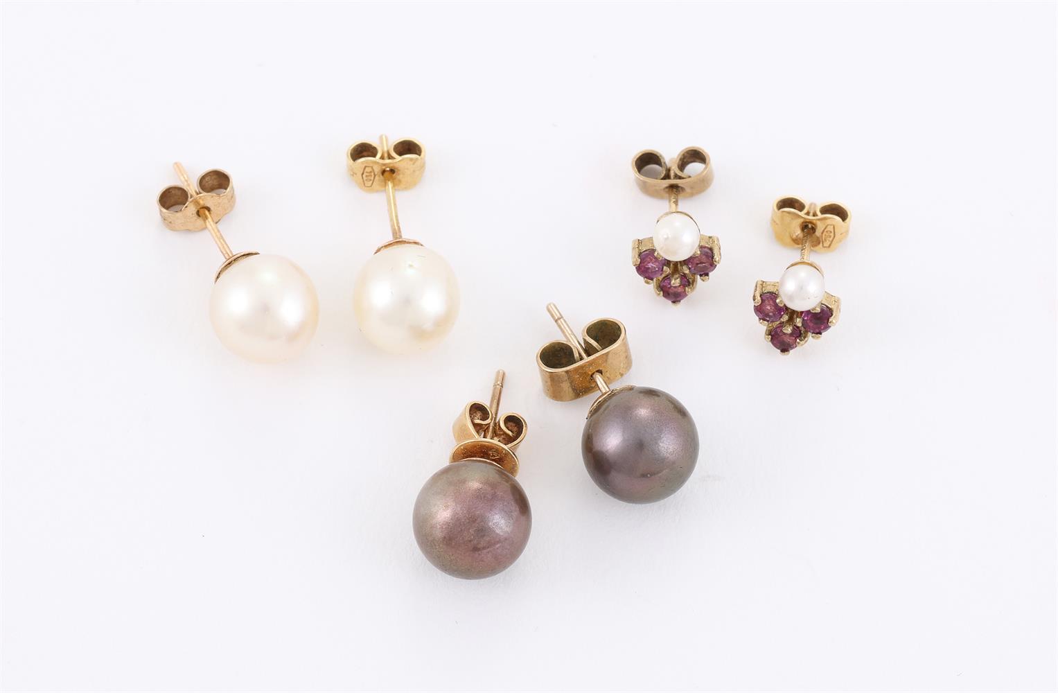 TWO PAIRS OF CULTURED PEARL EARRINGS, AND A PAIR OF RUBY AND CULTURED PEARL...