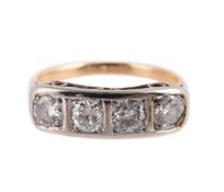A DIAMOND FOUR STONE RING