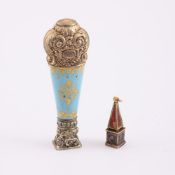 A GOLD AND ENAMEL PYRAMID SHAPED SEAL