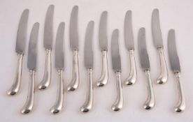 A SET OF SIX SILVER PISTOL GRIP HANDLED DESSERT AND TABLE KNIVES