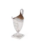 A GEORGE III SILVER HELMET CREAM JUG