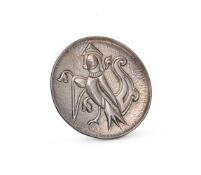 A SILVER COLOURED CIRCULAR DISH