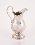 A SWEDISH SILVER BALUSTER JUG