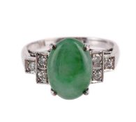 A JADEITE JADE AND DIAMOND RING