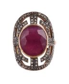 A GLASS-FILLED RUBY AND DIAMOND DRESS RING