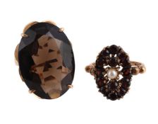 A SMOKY QUARTZ DRESS RING AND A GARNET AND CULTURED PEARL DRESS RING