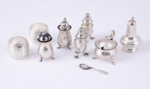 A COLLECTION OF SILVER CRUET ITEMS