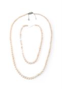 A CULTURED PEARL NECKLACE WITH DIAMOND CLASP