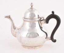 A LATE VICTORIAN SILVER BACHELOR'S BALUSTER TEA POT