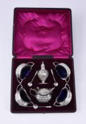 A CASED VICTORIAN SILVER SIX PIECE CRUET SET