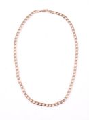 A 9 CARAT GOLD FLATTENED CURB LINK NECKLACE SHEFFIELD, 1989 IMPORT MARK