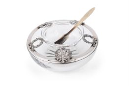 A SILVER COLOURED MOUNTED CAVIAR DISH