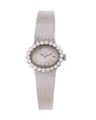 OMEGA, A LADY'S WHITE GOLD COLOURED AND DIAMOND BRACELET WATCH
