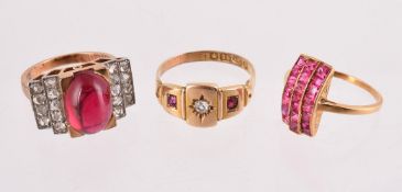 A COLLECTION OF THREE DRESS RINGS