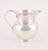 A VICTORIAN SILVER JUG