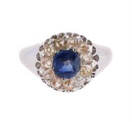 A SAPPHIRE AND DIAMOND CLUSTER RING