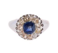 A SAPPHIRE AND DIAMOND CLUSTER RING