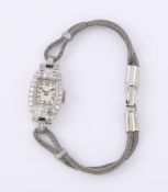 AGASSIZ W. CO., A LADY'S PRECIOUS WHITE METAL AND DIAMOND COCKTAIL WATCH