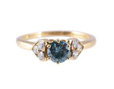 A TREATED BLUE DIAMOND AND DIAMOND RING