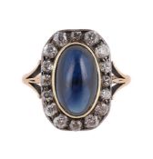 A SAPPHIRE AND DIAMOND PANEL CLUSTER RING