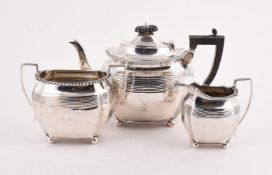 A VICTORIAN SILVER OBLONG THREE PIECE TEA SET
