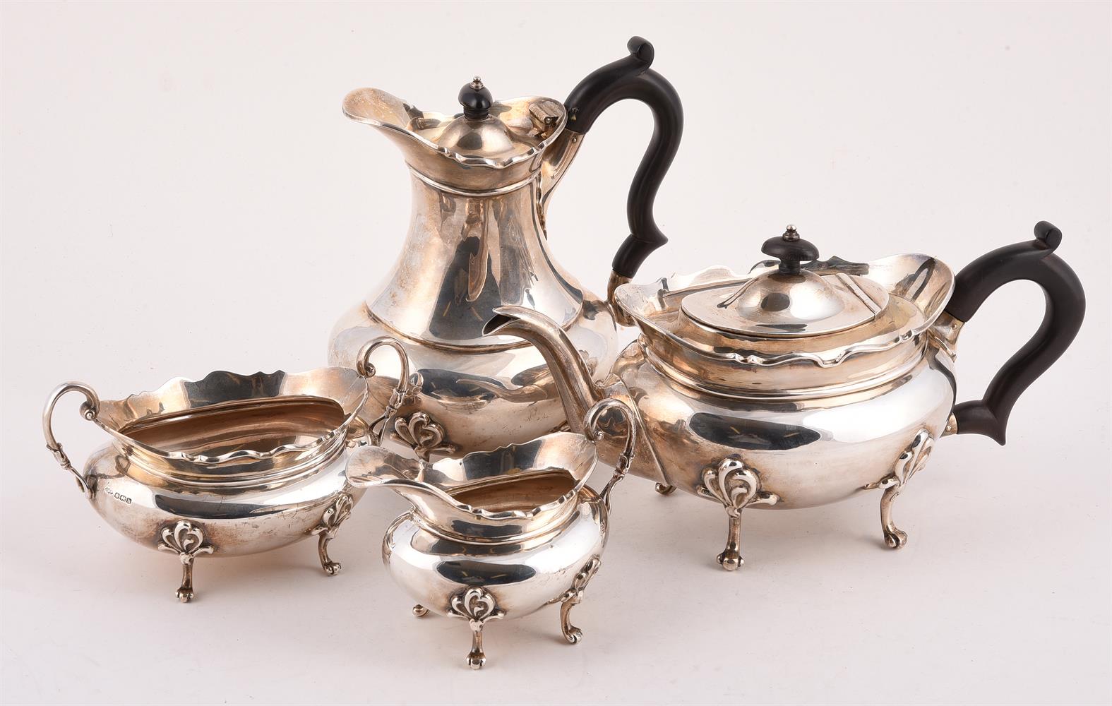 A MATCHED SILVER FOUR PIECE OVAL TEA SET