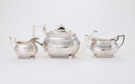 Y A MATCHED SILVER THREE PIECE OBLONG BALUSTER TEA SET