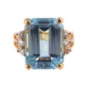 A BLUE TOPAZ AND DIAMOND RING