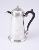 AN EDWARDIAN SILVER TAPERING HOT WATER POT