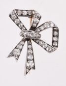 A LATE 19TH CENTURY DIAMOND BOW BROOCH