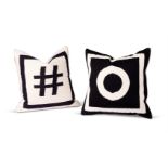 TWO BLACK AND WHITE CUSHIONS BY JONATHAN ADLER