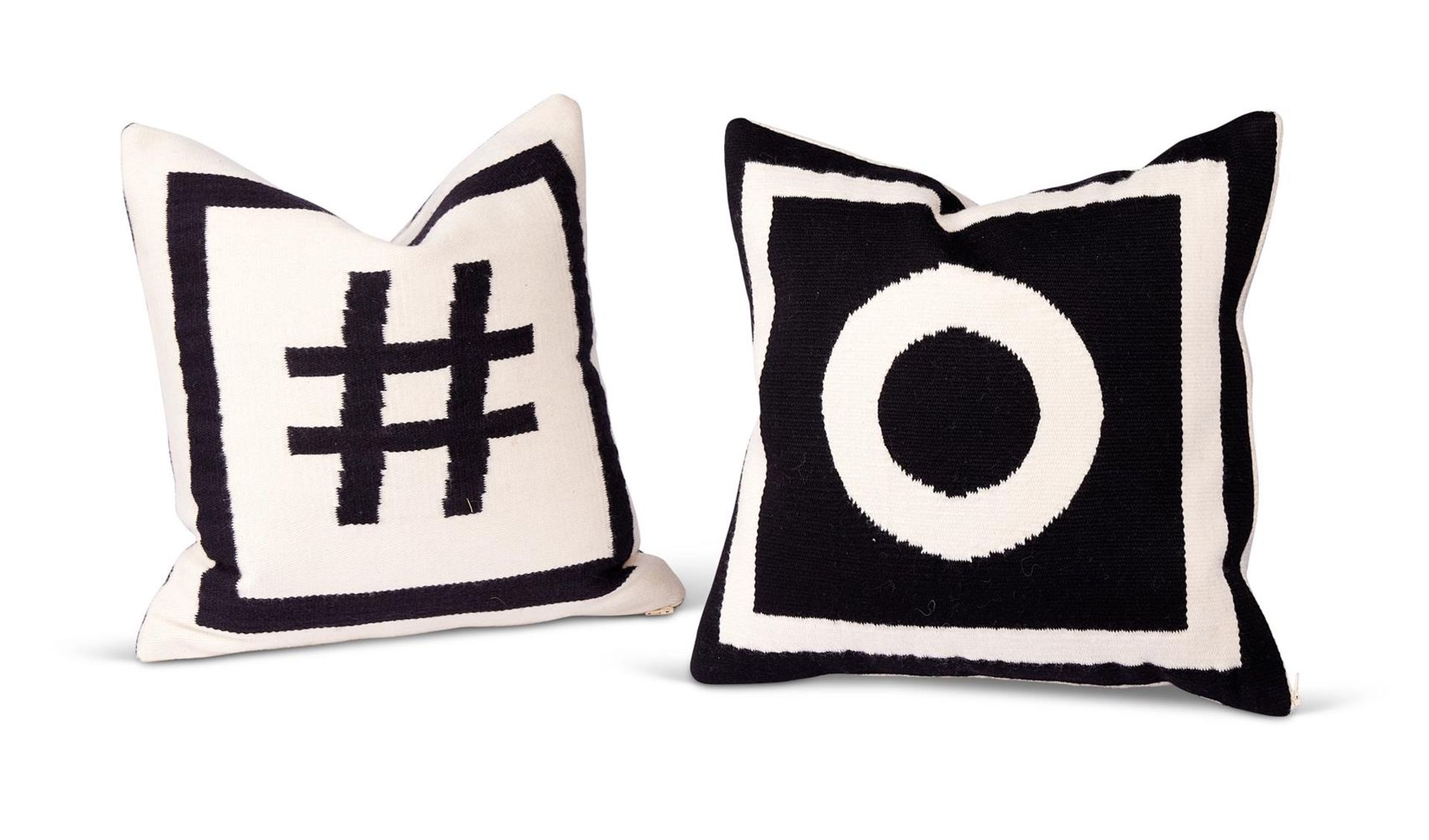 TWO BLACK AND WHITE CUSHIONS BY JONATHAN ADLER