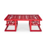 A RED PAINTED 'SHIGA' COFFEE TABLE