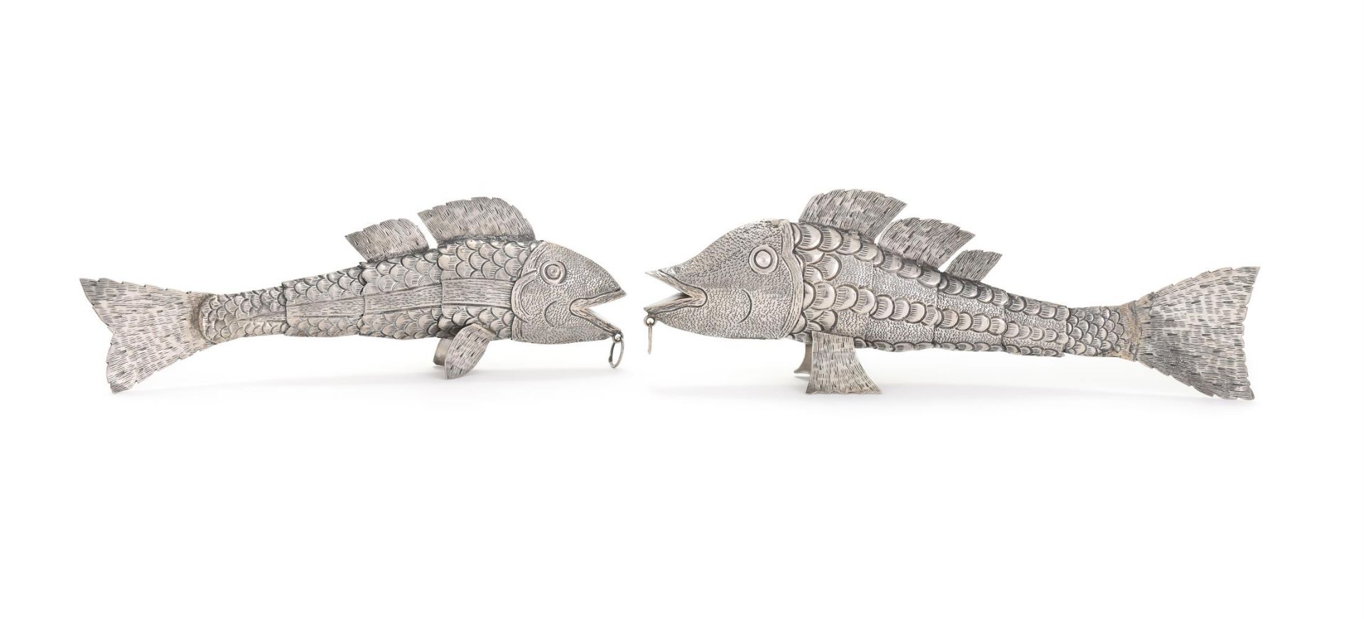 TWO SILVER COLOURED ARTICULATED MODELS OF FISH