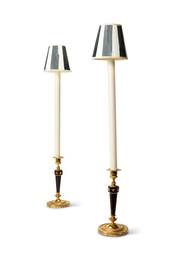 A PAIR OF EMPIRE GILT AND PATINATED BRONZE CANDLESTICKS AFTER GALLE AND PERCIER EARLY 19TH CENTURY