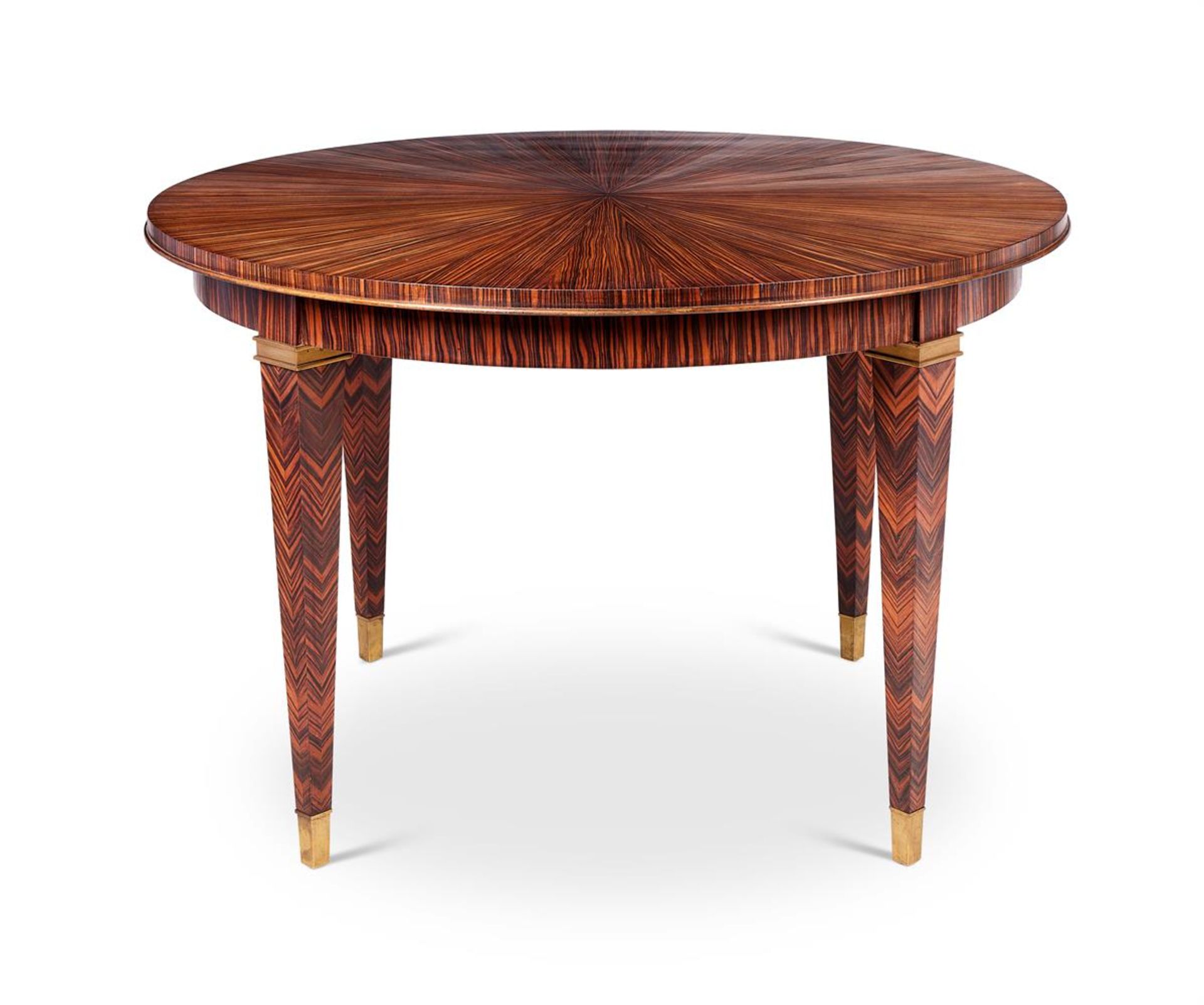 Y A BRASS MOUNTED MACASSAR EBONY CIRCULAR CENTRE TABLE, MID 20TH CENTURY