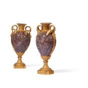 A PAIR OF GILT ORMOLU MOUNTED GRANITE VASES IN THE LOUIS XVI STYLE, FRENCH