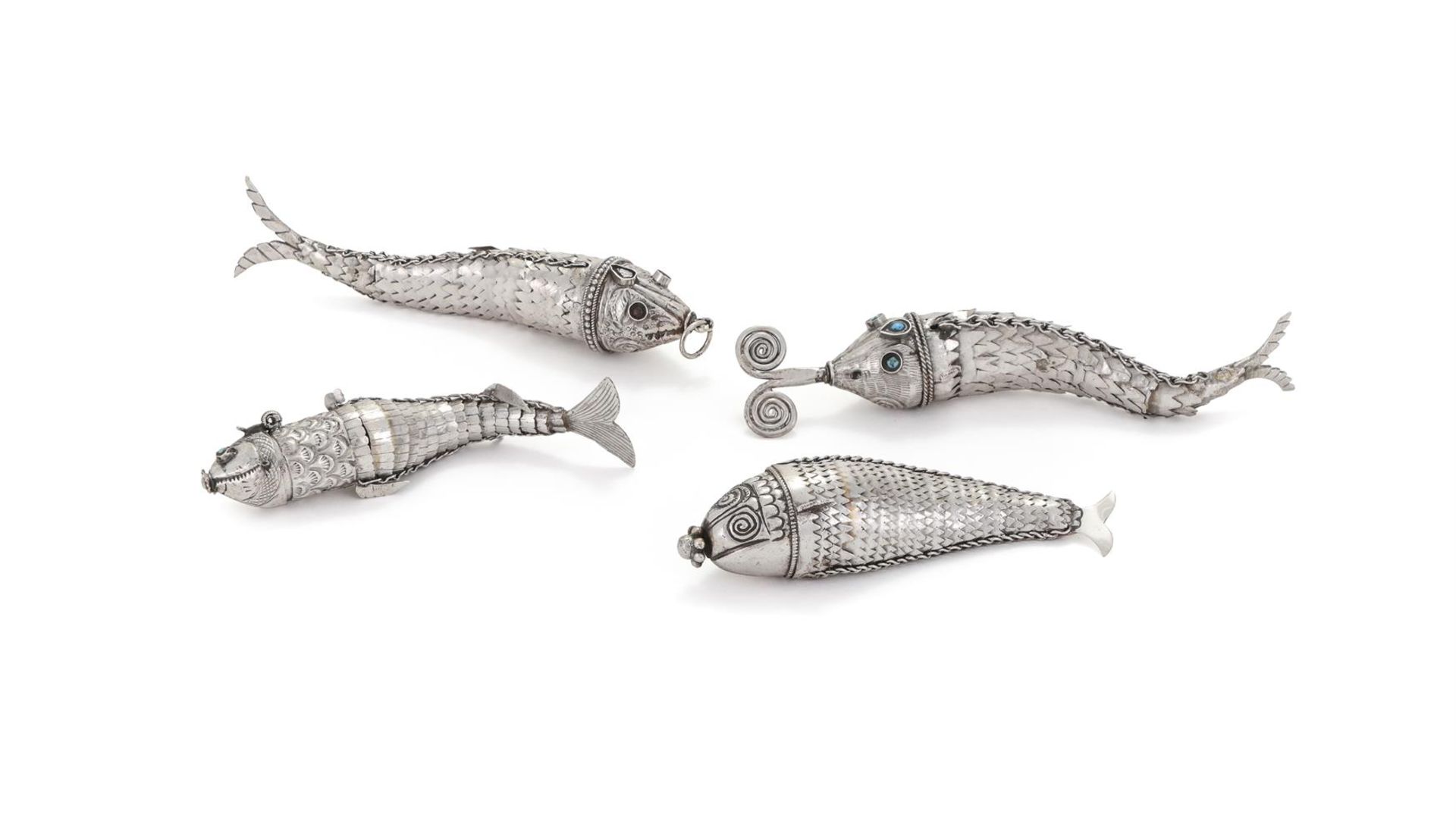FOUR WHITE METAL ARTICULATED FISH