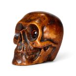 AN AMERICAN WOODEN SKULL TIMEPIECE, EARLY 20TH CENTURY