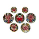 A GROUP OF SEVEN SIMILAR CALDAS DA RAINHA MAIOLICA PLATES IN BERNARD PALISSY STYLE, PORTUGAL